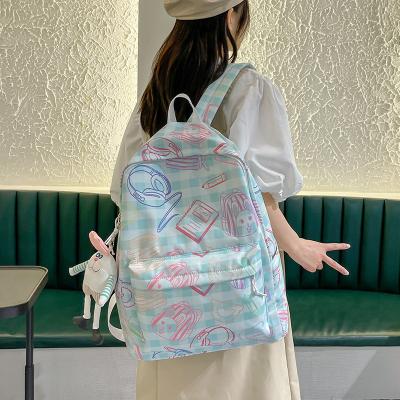 China New fashion backpack waterproof simple schoolbag printed student schoolbag leisure campus wind trend niche graffiti design canvas bag for sale