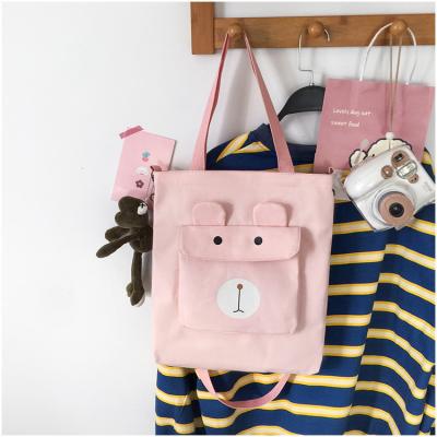 China Fashion large capacity canvas bag 2023 cute two color printing student school bag again one shoulder cross-body journal for sale