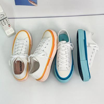 China Lace up trend low top canvas shoes for women sneakers sports shoes for school girls casual walking shoes for sale