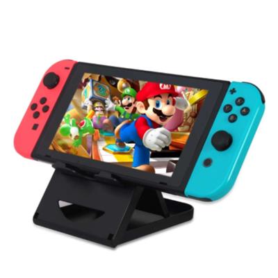 China Stand Compact Adjustable ABS Bracket Game Stand Holder For Nintendo Switch Console Controller for sale