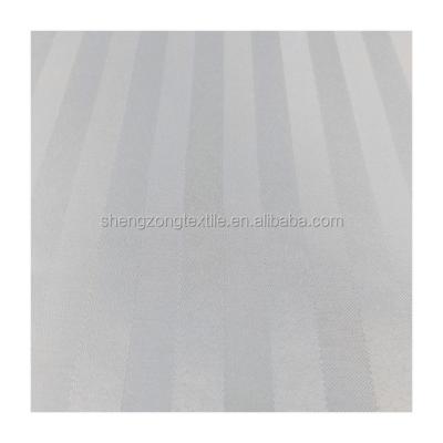 China Hotel Anti-Static Bed Linen Bedding Sheet Fabric White Color 90~120gsm Peach Skin Fabric for sale