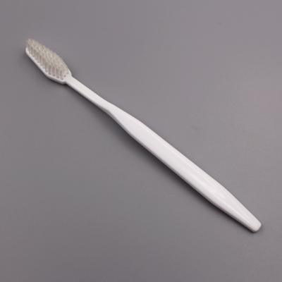 China Tapered Foldable Medium Stiffens Handle White Travel Hotel Toothbrush for sale