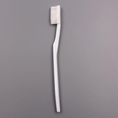 China Foldable OEM Tapered White Bristle Handle Travel Hotel Toothbrush for sale