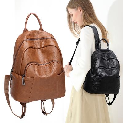 China With USB vegan PU leather backpack women pinch light anti-theft backpack school shoulder backpack bag for sale