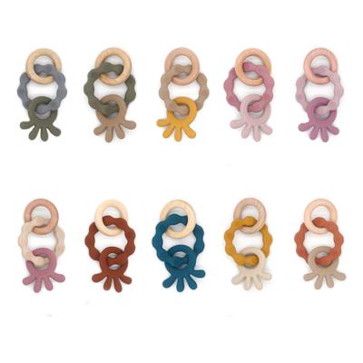 China Soft Cartoon Octopus Form BPA Free Food Grade Bead Beech Wooden Teether Ring Silicone Baby Teether Bracelet for sale