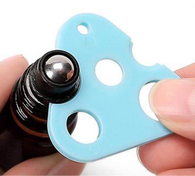 China Sustainable Triangle And Oval Essential Oil Plastic Bottle Opener Twist Key Tools for sale