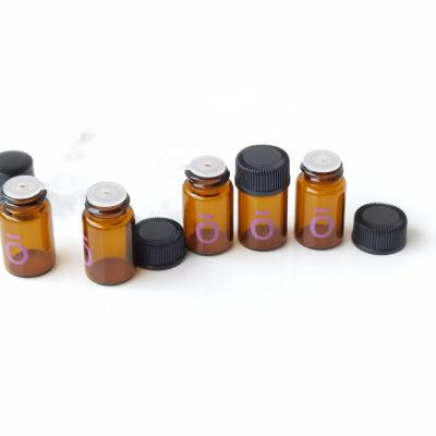 China Mini Essential Oil Bottle Jar Refillable Glass Essential Oil Vials Orifice Brown Reducer Cap Bottles Cosmetic Containers for sale