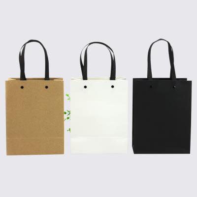 China 2022 Fashion Hot Product Brown Bulk Paper Shopping Bags For Small Business With Custom Logo for sale