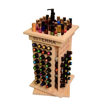 China Wooden Rotating Essential Oil Storage Display Holder Rack 125 Slot Organizer For Essentials Oil Bottle Viable for sale