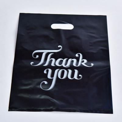 China Shopping Factory Price Customized Logo Size Printing With Hand Hole Plastic Clothing Shopping Bag for sale