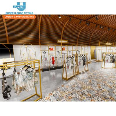 China MDF Garment Shop Interior Design Glass Luxury Clothing Showroom Interior Design for sale