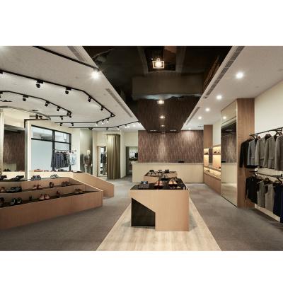 China MDF Stylish Interior Design Concept For Men Clothing Retail Stores Mini Stylish Garment Shop Showroom Decoration Display System Layout for sale