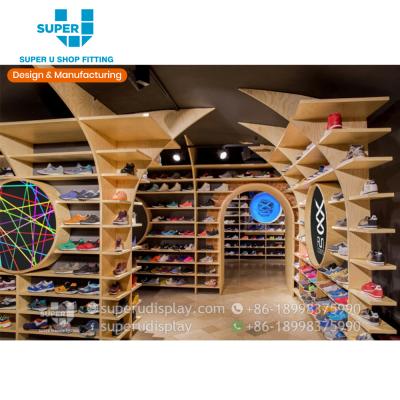 China MDF sports shoes shop display fittings high end shoes display stand sports shop decoration retail design for sale