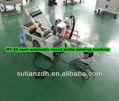 China MT-50 Manual Food Round Bottle Labeling Machine; semi automatic adheisve labeling machine; semi automatic labeling machine manufacturer for sale