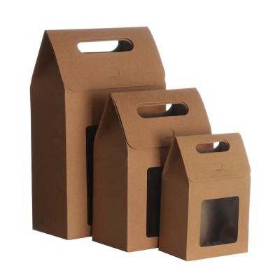 China Custom Materials Recycled Logo Printed Kraft Paper Craft Bag With Clear PVC Window Candy Gift Bag for sale