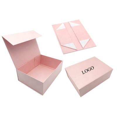 China Recycled Materials Customized Rose Book Shaped Gift Clamshell Box Magnetic Christmas Packing Gift Box for sale