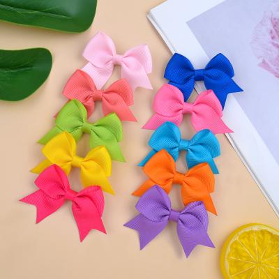 China Fashion kids accessories 2022 fashion baby tied headband candy color bow butterfly hairpin nylon accessories for sale