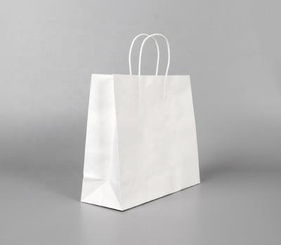 China Disposable Eco - Friendly White Black Shopping Paper Bag With Printed Logo for sale