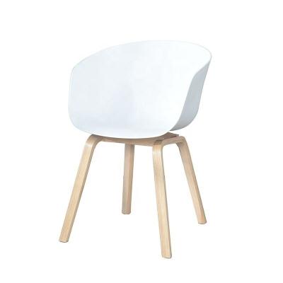 China Extensible Fashionable PP Seat Dining Chair With Natural Wood Frame for sale