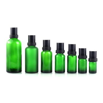 China Personal Care 10Ml 20Ml Green Color Glass Essential Oil Bottle With Aluminum Screw Lid Fashion Design Attractive Essential Oil Bottle for sale