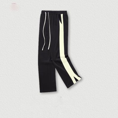 China Anti-wrinkle autumn and winter American style side panel split straight leg pants men's wide leg pants youth casual men's pants for sale