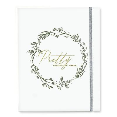 China High quality custom planner spiral wedding a5 spiral planner printing pure white hard cover wedding guest book for sale