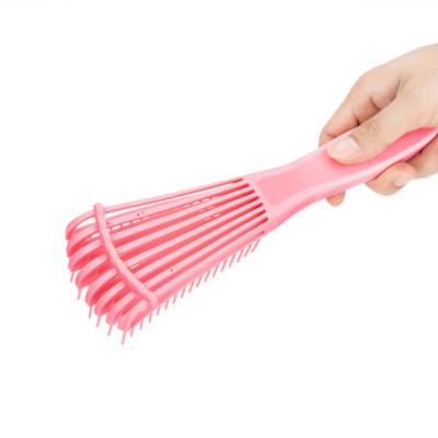 China Cushion Plastic Octopus Shape Hair Styling Eight-claw Massage Comb Teeth Handle Duct Hairbrush Rubber Detangle Brush for sale