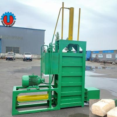 China Animal Bedding Weighting Baler Machine for Wood Shavings Packing 600KG for sale