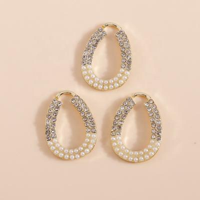 China 4pcs/bag 21*14mm Crystal Pearl Round Circle Oval Pendant Volume Of Durable Exquisite Luxury Custom Jewelry Necklace DIY Pendants for sale