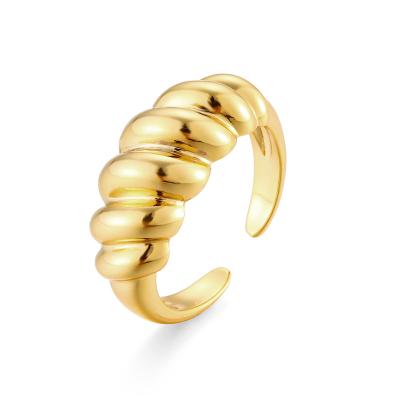 China Environmental Friendly Hot Wire Crescent Ring Korean Copper Plated Real Gold Twist Ring Jewelry for sale