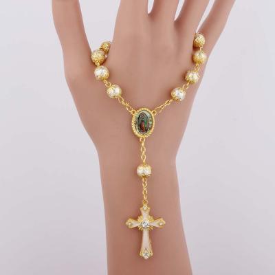 China Jesus Our Lady Car Rosary Glass Bracelet Christ Cross Rosary Bead Europe Religious Gold Catholic Bracelet for sale