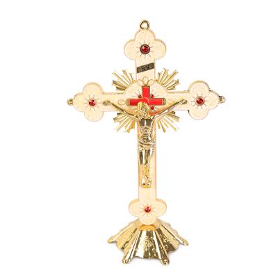 China Europe Large Gold Color Holy Crucifix Ornaments Crossed Cross of Emmanuel Jesus Cross Statue Standing with Low Figure Figurine for sale