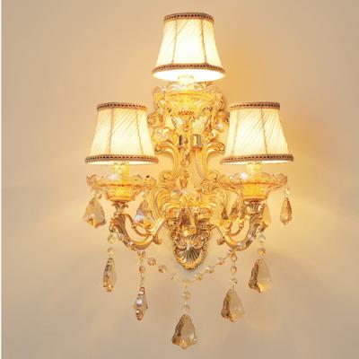 China Modern Unique Art Alloy Zinc Cut Beside Art Wall Light Crystal Wall Lamp For Bedroom for sale