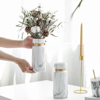 China (1300 degree) wholesale modern luxury marble style porcelain floreros high temperature fired ceramic flower vases for home decor for sale