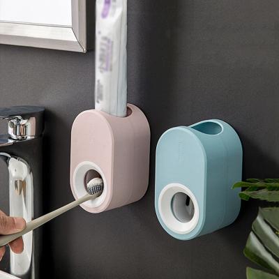 China New Design Wall Mounted Punchless Automatic Toothpaste Stored Squeezing Device for sale