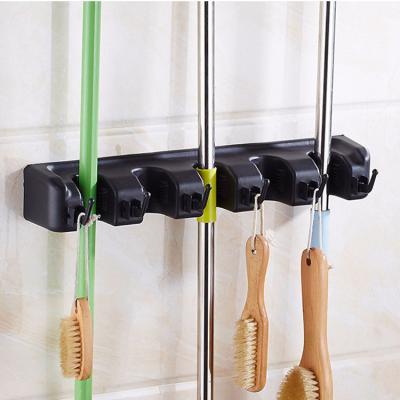 China Mop Hanger Garage Garden Tool Organizations Storage Stand Mop Hanger Organizer and Broom Holder Wall Mount for sale