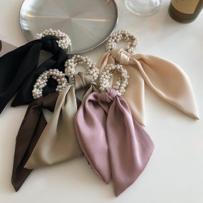 China Popular Silk Hair Scrunchies Hair Ties Ponytail Accessories Hair Pearl Ribbon Bow Elastic Hair Band for sale