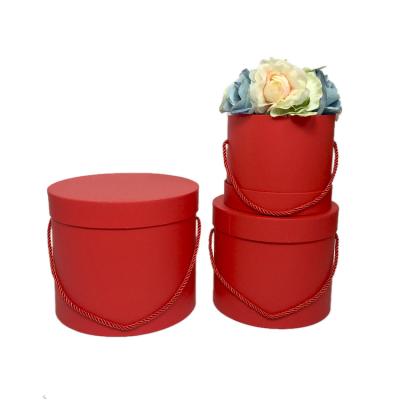 China The Recycled Materials Provided By The Current Hot Selling Cylinder Florist Portable RED Round Flower Hat Box Flower Gift Box 3 Square for sale