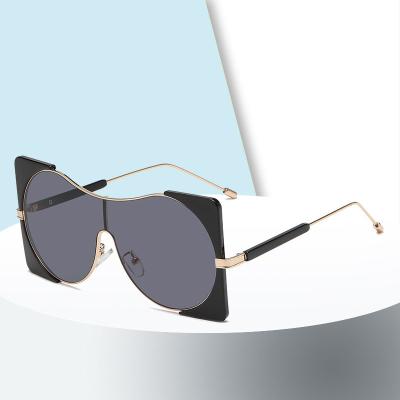 China Fashion Sunglasses Shape Big Frame One Piece Lady Eyeglasses Sun Glasses Round Frame Retro Metal Punk Sunglasses for sale