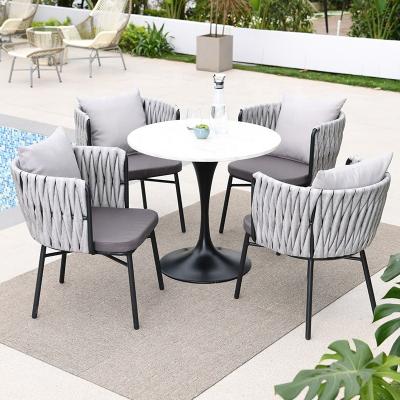 China Europe Outdoor Furniture Wholesale Popular Corner Rope Dining Room All Weather Balcony 5 Pcs Dining Restaurant Chair Table Set Cafe Chairs for sale