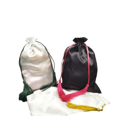 China Hot Sale Purchasing Bags Tassels Hair Bundle Silk Satin Bags Wig Packaging Satin Tassel Hair Bags for sale