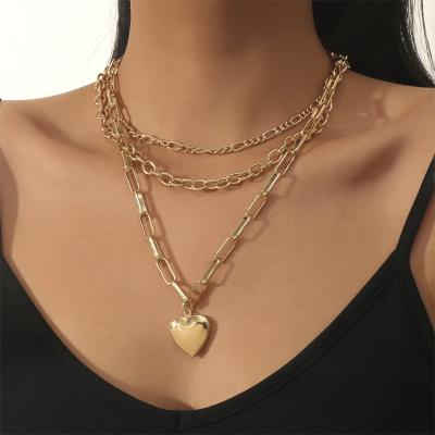 China TRENDY Fashion Sweater Chain Alloy Metal Love Heart Multilayer Golden Pendant Necklace For Women for sale