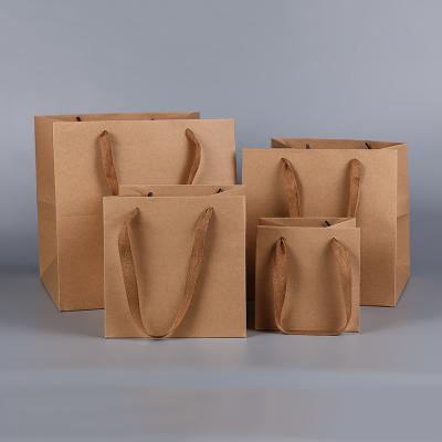 China Biodegradable Custom Paper Bag Clothing Shoe Packaging Gift Logo Print Shopping Paper Bag for sale