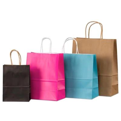 China Strong Lifting Kraft Paper Bag Clothing Store Clothes Customized Cool Logo Customized Gift Packing Takeaway Shopping Handbag for sale