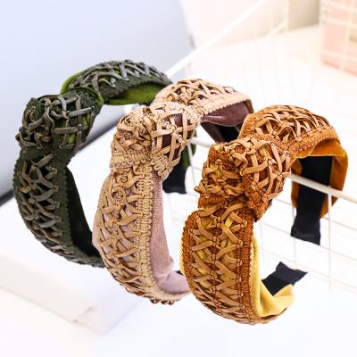 China WT993A Unique Eco-friendly Solid Color PU Decorated Hairband Solid Color Cloth Custom Hairbands Headbands For Women for sale