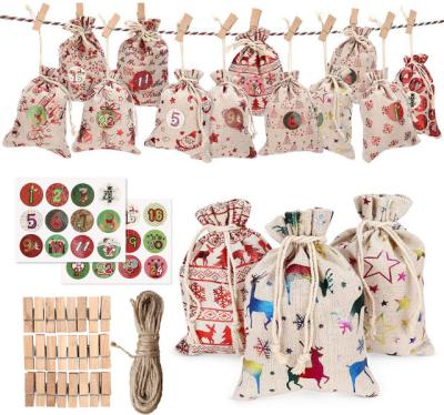 China Christmast Ornament Wholesale 24 Pieces Kids Christmas Drawstrings Canvas Candy Bags Santa Sack Gift Bag Set Canvas Christmas Decorations for sale