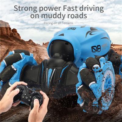 China Hot Selling Obstacle Avoidance OEM 360 Degree Flipping Racing Car Dual Sided Gesture Sensor Watch Toy RC Cars for sale