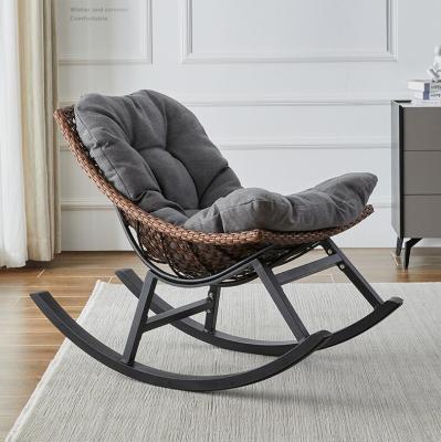 China Reclining Nordic Advanced Rattan Rocking Chair With Padded Outdoor Furniture for sale