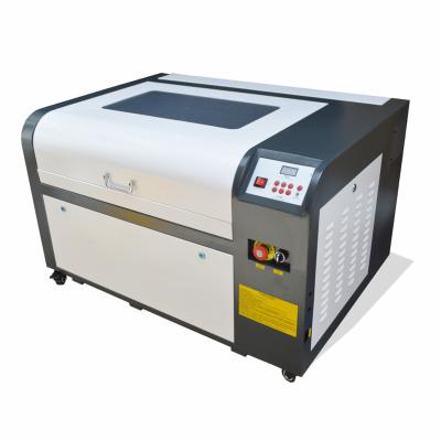 China Laser Engraving 60w 80w CNC CO2 Laser Engraving Machine Price 4060 Mini Laser Engraver 6090 For Acrylic Leather Engraving for sale