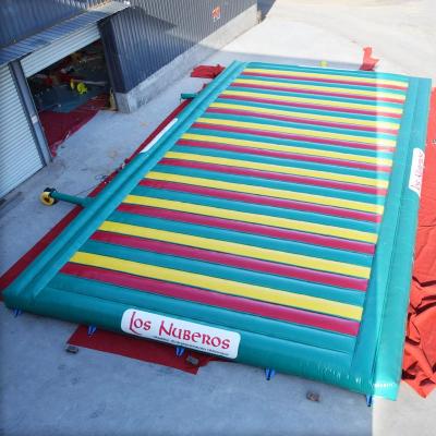 China Factory price children playland commercial custom cheap outdoor inflatable bounce jump mat inflatable jump pad for sale for sale